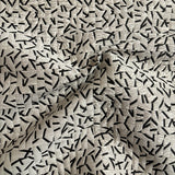 Remnant of Momentum Clip Ivory Black Upholstery Fabric